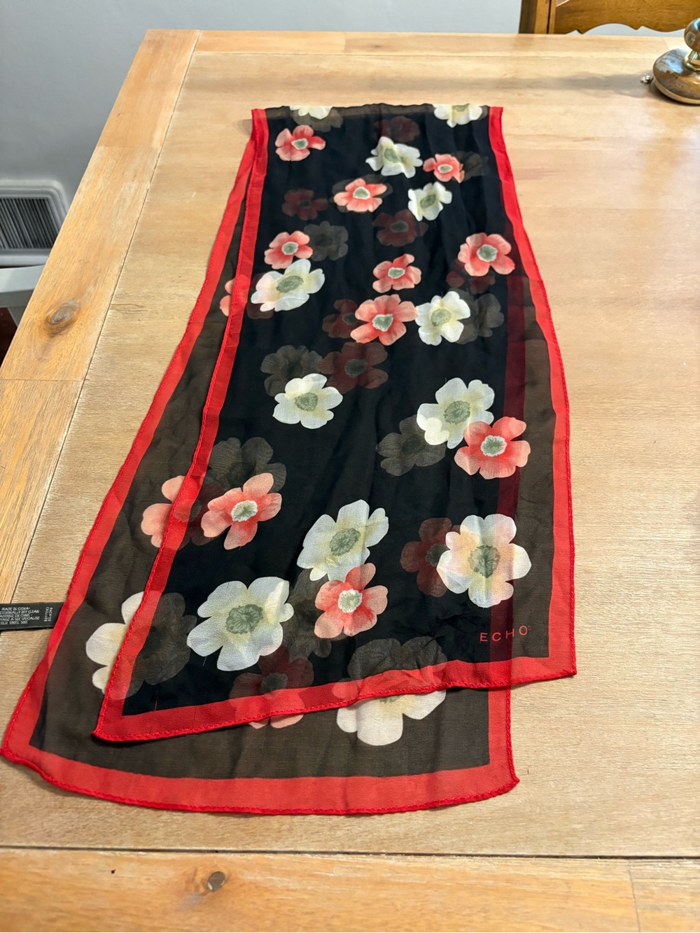 Echo Black Floral Sheer Scarf with Red Trim